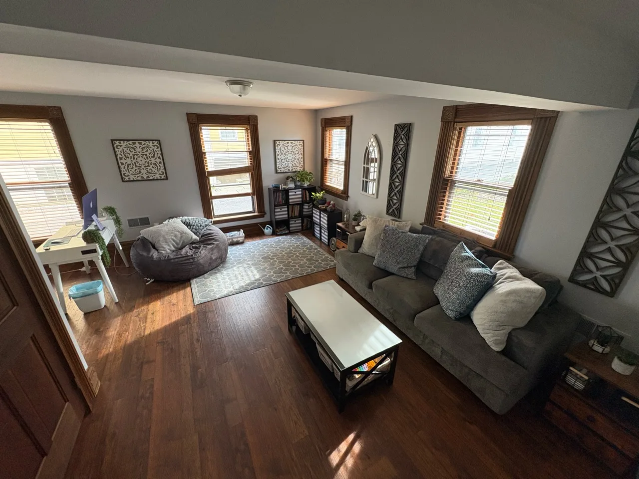 Therapy room with a couch, beanbag chair, and windows